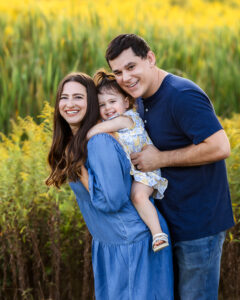 Family Snuggling together at buckeye woods park Medina ohio