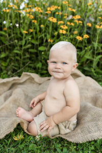 Little boy smiling at camera at Wooster park 