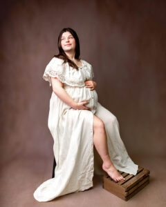 Cleveland studio maternity session in neutral gown from client closet 
