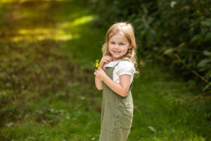 Child portrait with fun props during a stress-free family session by Danielle Ashley Photography