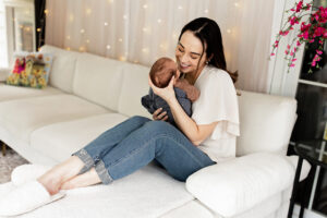 mom gazing at her newborn in complete awe of his beauty