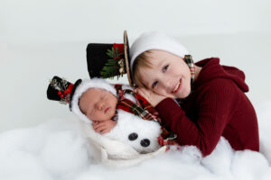 two brothes in pretend play costumes during the long cold winter months in cleveland ohio 