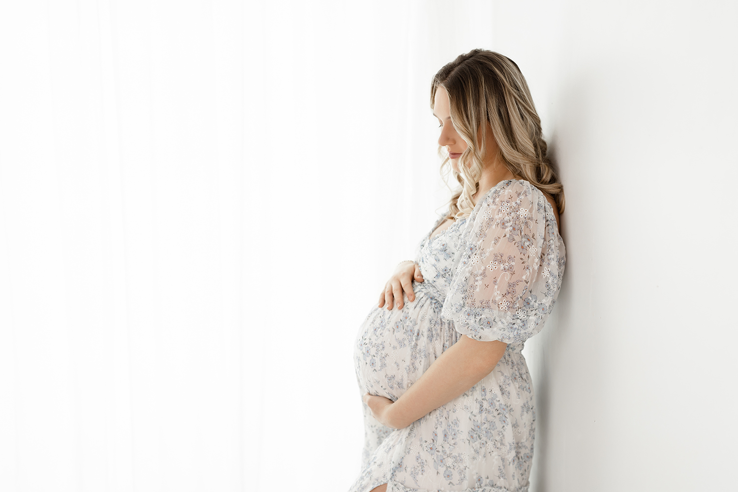 Cleveland maternity photographer capturing timeless studio maternity portraits