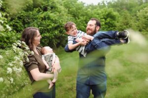 Family Playing in Medina spring park during their family photo lifestyle session 