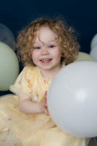 Family photographer in Medina Ohio capturing genuine smiles during an outdoor family session